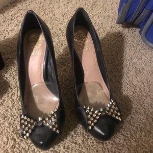 Black studded pumps